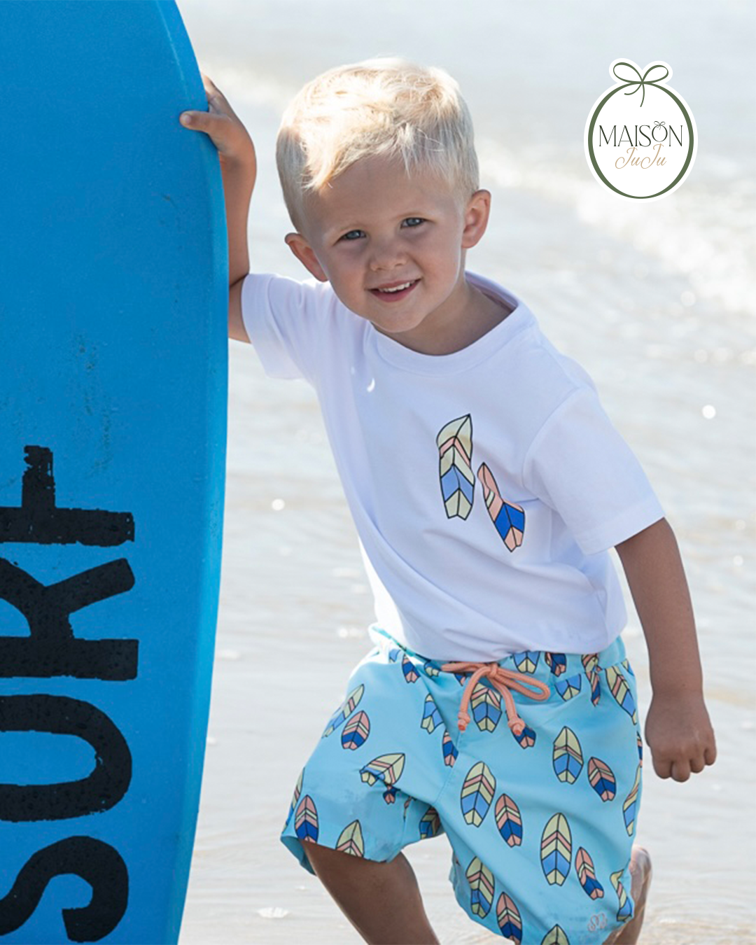 Surfboard print swim shorts for boys side view