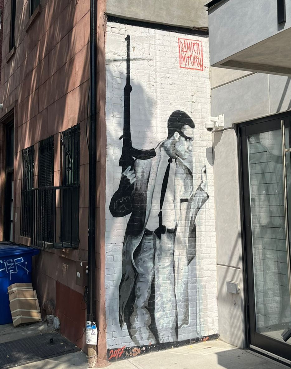 A mural by Damien Mitchen, blending modern artistry with local storytelling.